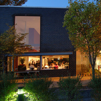 twilight image looking into windows of St. George's Restaurant 