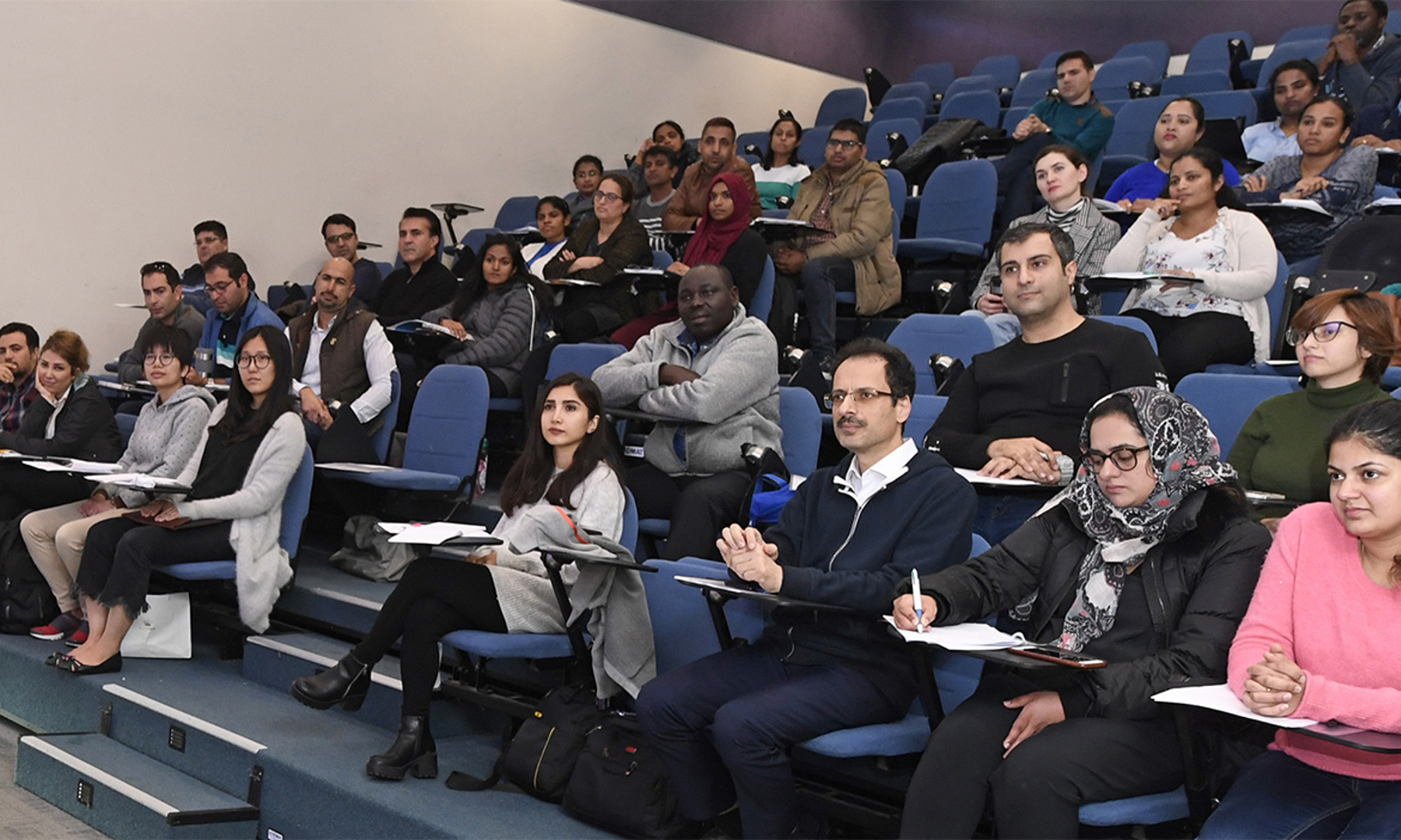 Students listening to a presentation