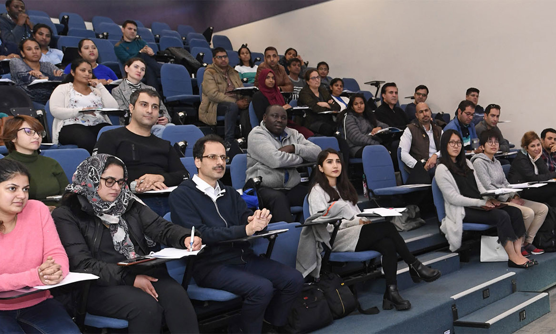 Students listening to a presentation